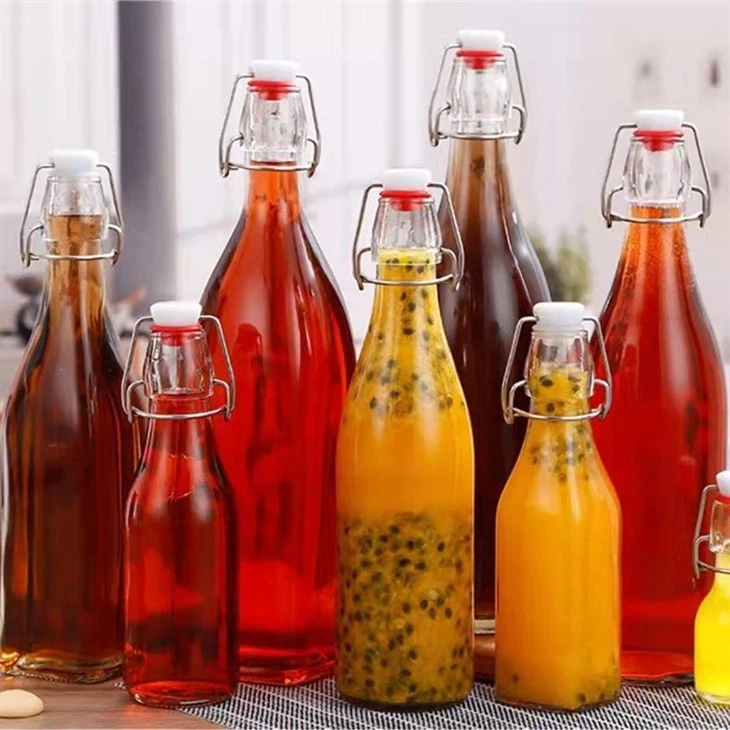 clear round glass wine bottle